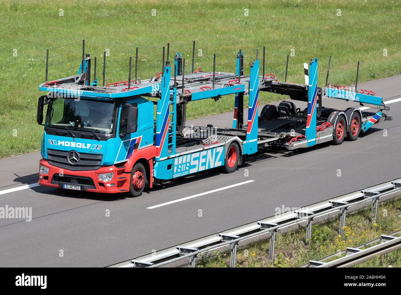 Mosolf Mercedes-Benz Actros car-carrying truck on motorway. Stock Photo