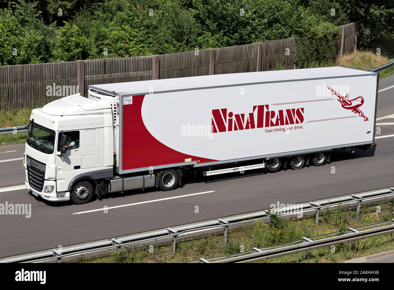 DAF XF truck with NinaTrans temperature controlled trailer on motorway