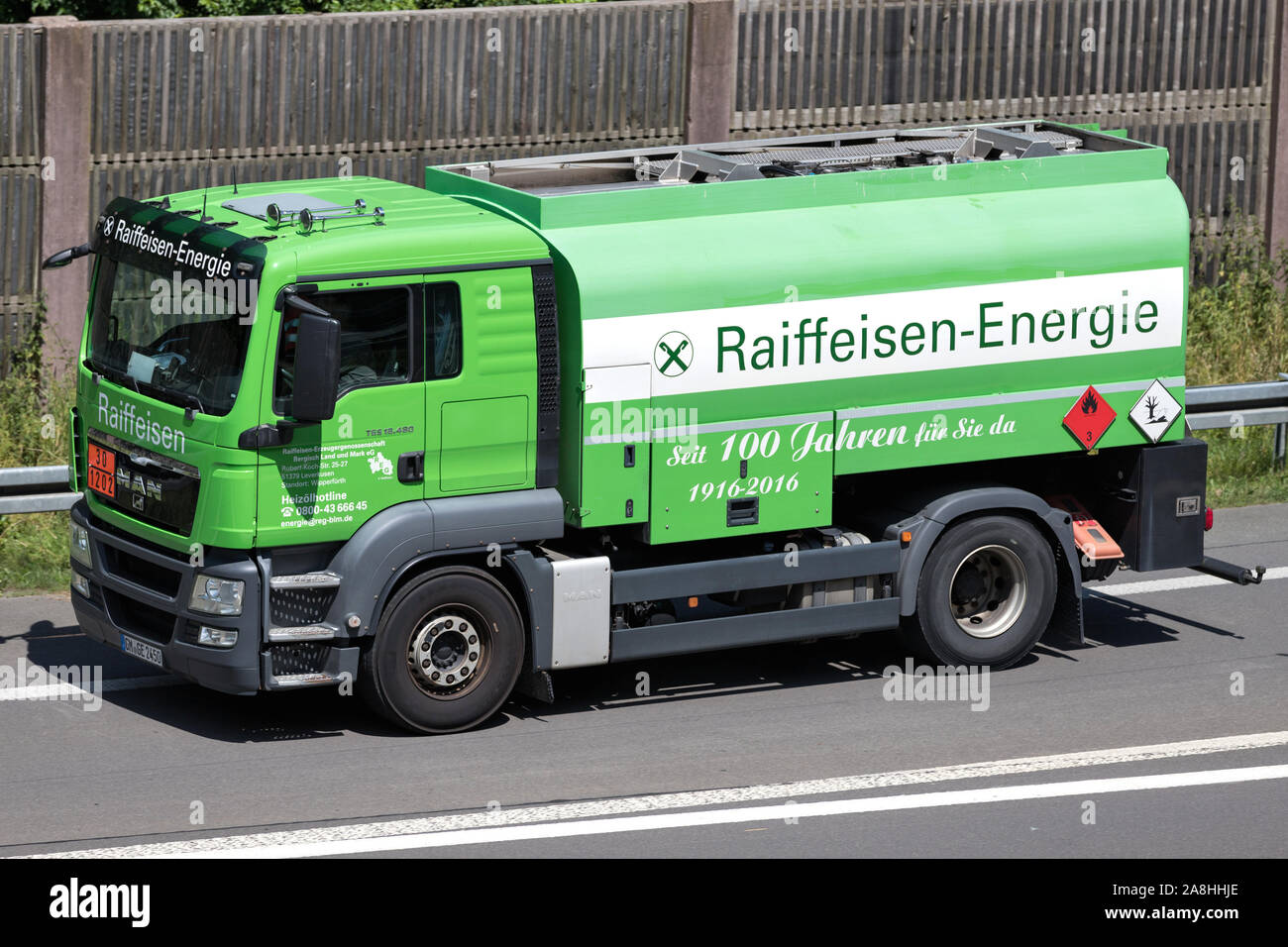 Raiffeisen Energie MAN TGS tank truck on motorway. Stock Photo