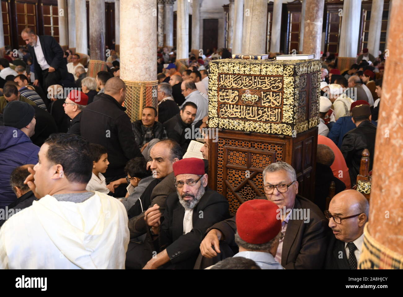 (191109) -- TUNIS, Nov. 9, 2019 (Xinhua) -- People gather in a mosque to celebrate Mawlid al-Nabi, the birthday of Prophet Muhammad, in Tunis, Tunisia, Nov. 9, 2019. (Photo by Adele Ezzine/Xinhua) Stock Photo