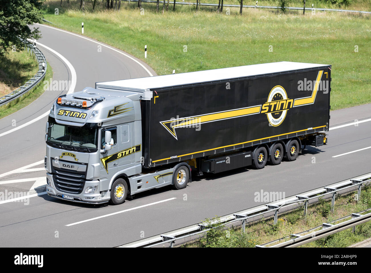 DAF XF truck with Dachser curtainside trailer on motorway Stock Photo -  Alamy