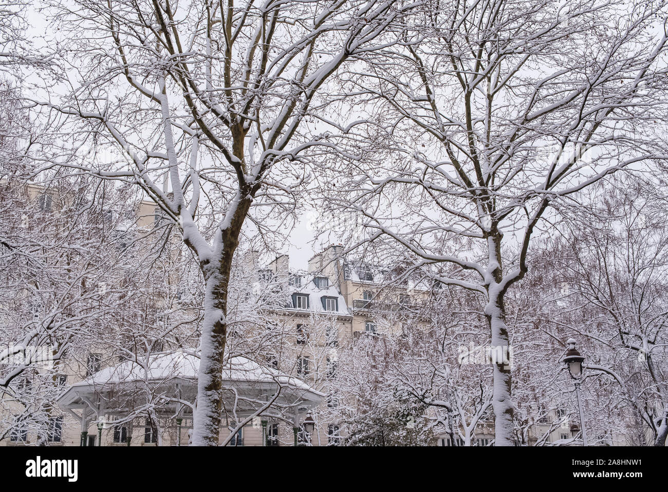 Paris under the snow, typical facades on the boulevard Richard-Lenoir Stock Photo