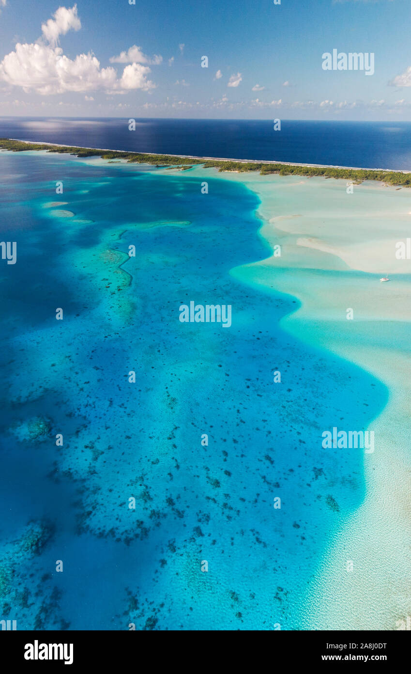 Sailing with catamaran in Tuamotu Archipelago french Polynesia - Aerial view of the lagoon by drone Stock Photo