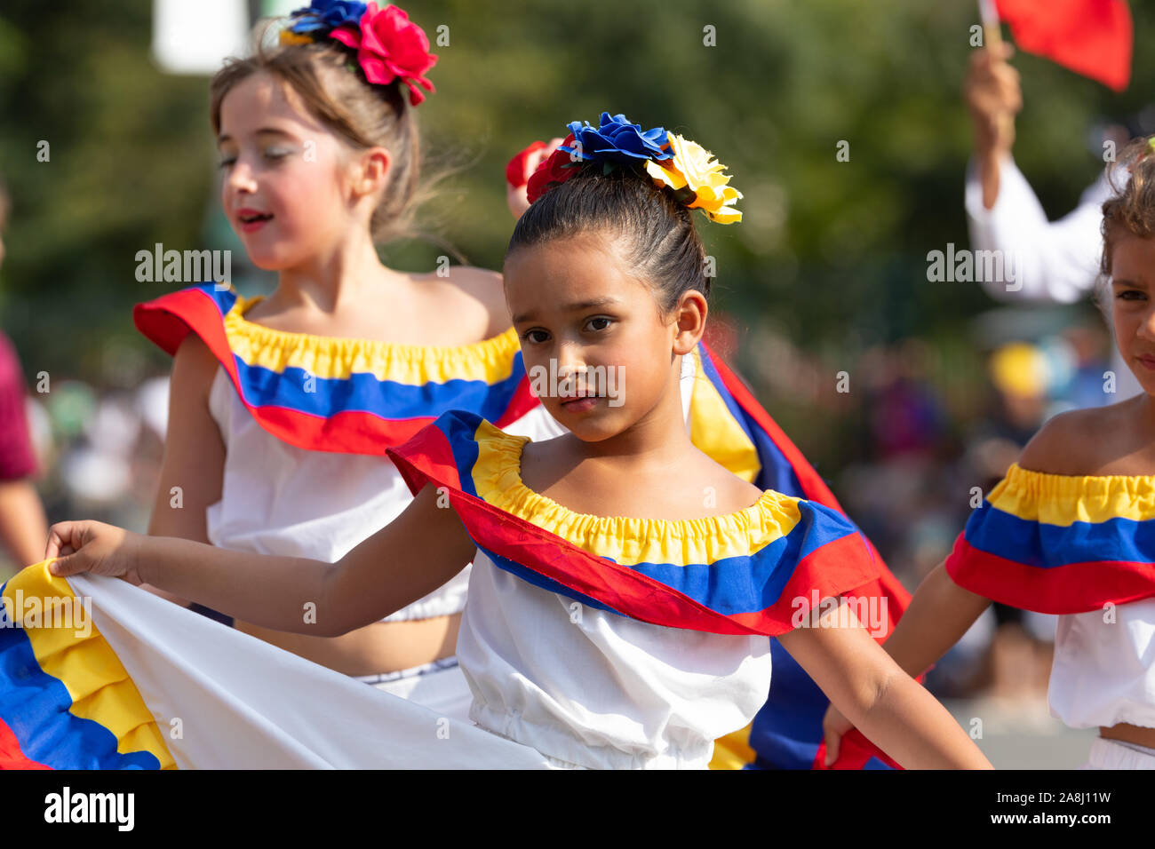 Washington DC, USA - September 21, 2019: The Fiesta DC, Venezuelan children dancing Joropos, wearing traditional dresses during the parade Stock Photo