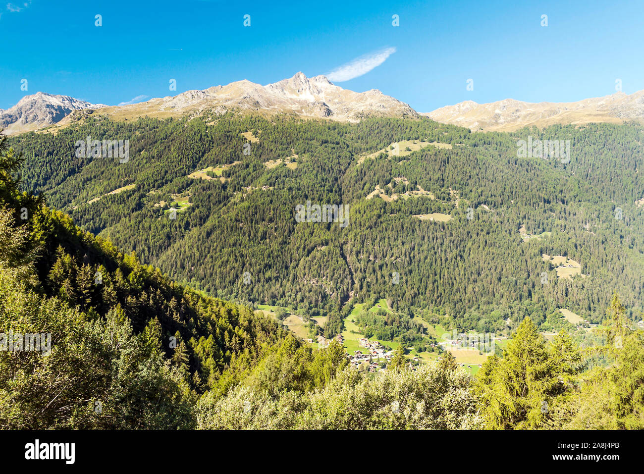 Mountains of the Swiss Alps in the Saint Luc valley on a sunny day. Stock Photo