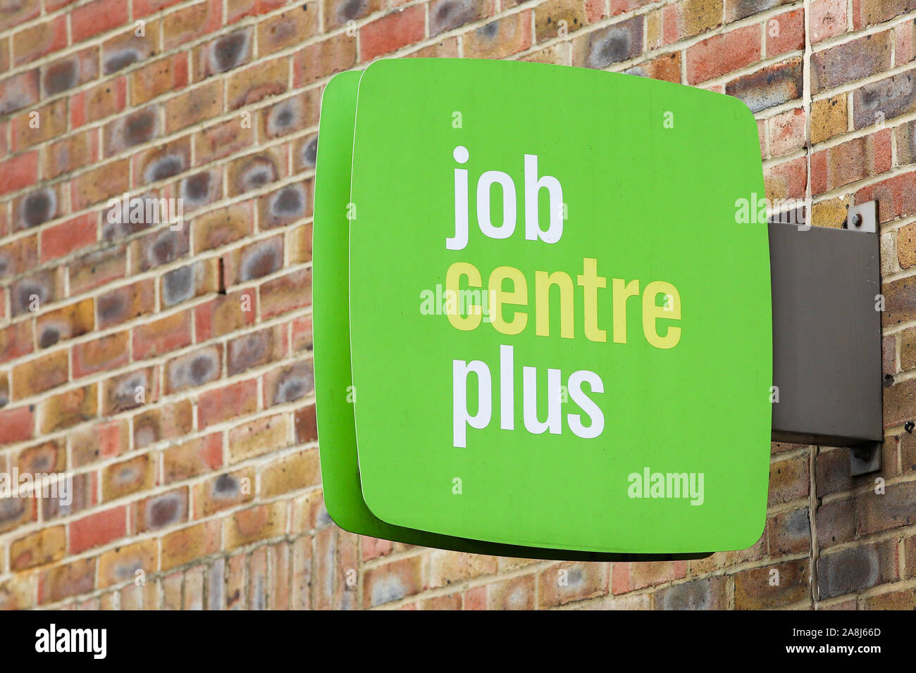 A Job Centre Plus sign is seen outside its central London office. Stock Photo
