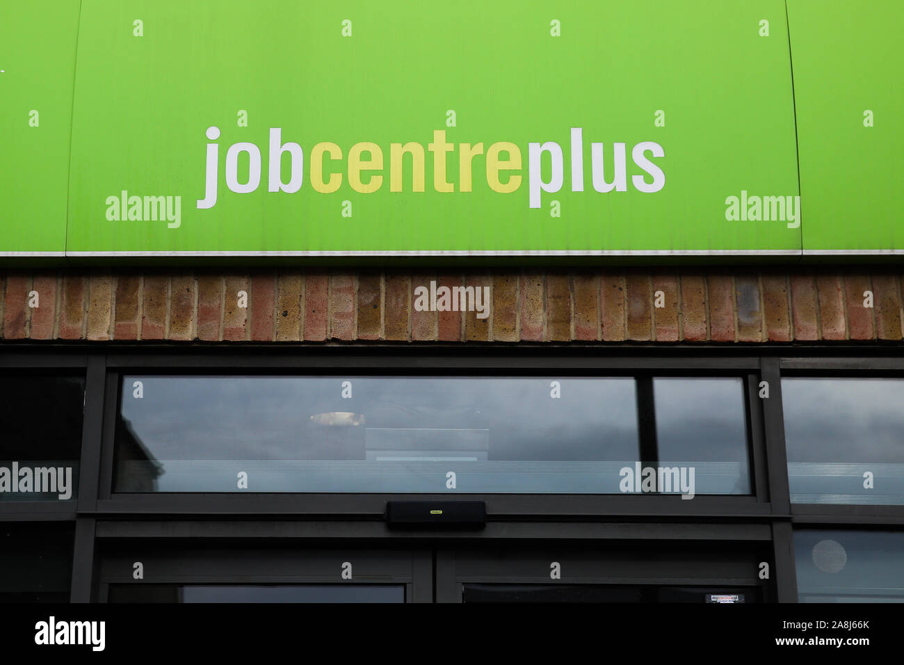 A Job Centre Plus sign is seen outside its central London office. Stock Photo