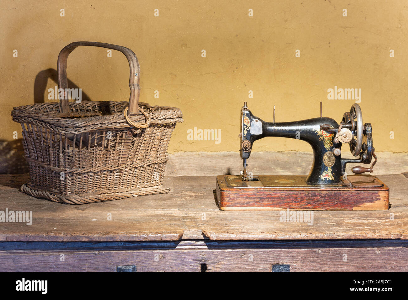 Dutch agricultural museum with reed basket and Singer sewing machine Stock Photo