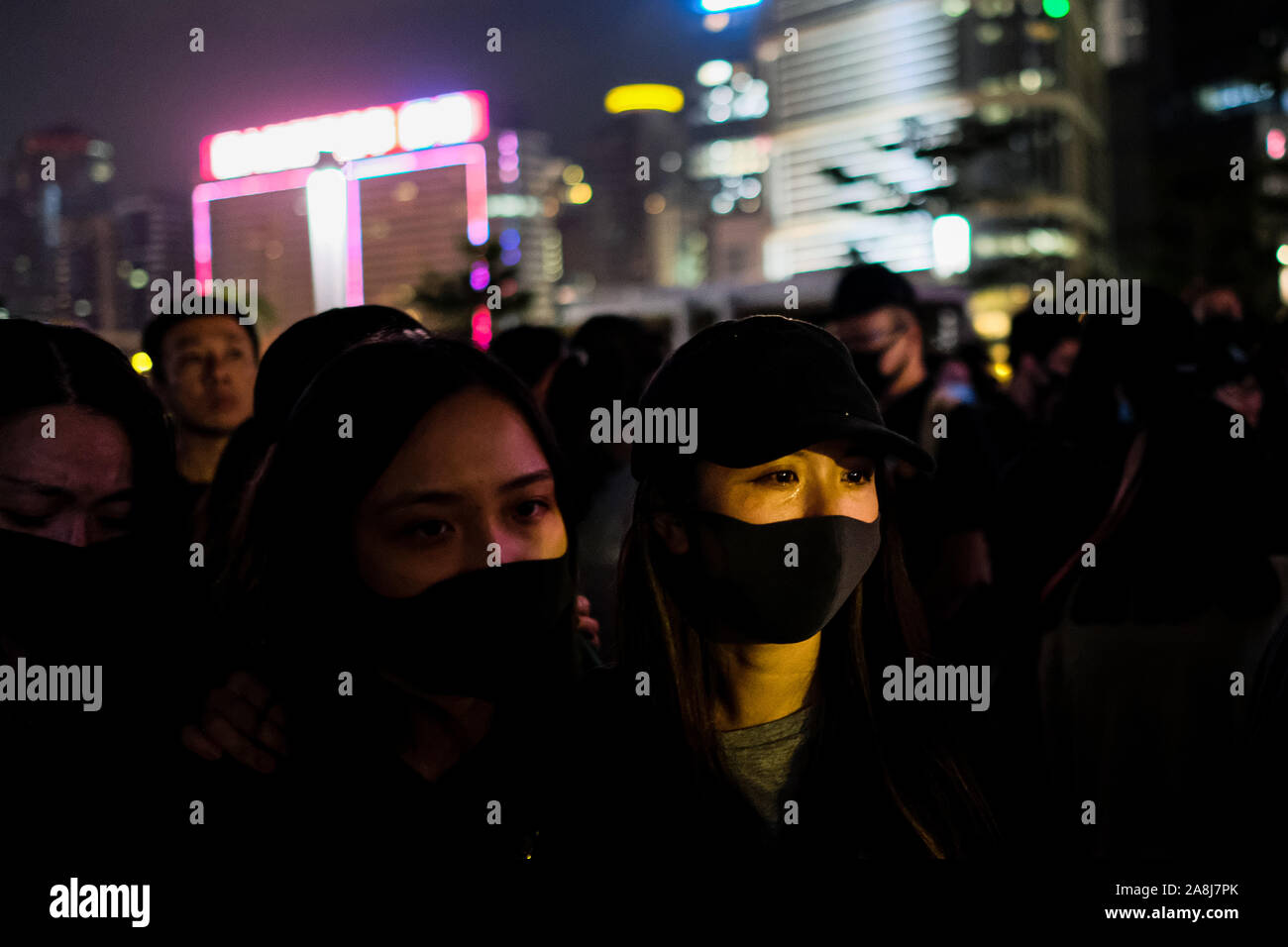 Hong Kong, China. 9th Nov, 2019. Tens of thousands of Hong Kongers participate during a memorial rally at Tamar Park in Hong Kong to mourn the death of a 22 years old university student Alex Chow Tsz Lok, who died from a serious brain injury during a fall on November 4th as police skirmished with demonstrators last weekend. He was left in critical condition and died after suffering a cardiac arrest on Friday. Credit: Keith Tsuji/ZUMA Wire/Alamy Live News Stock Photo