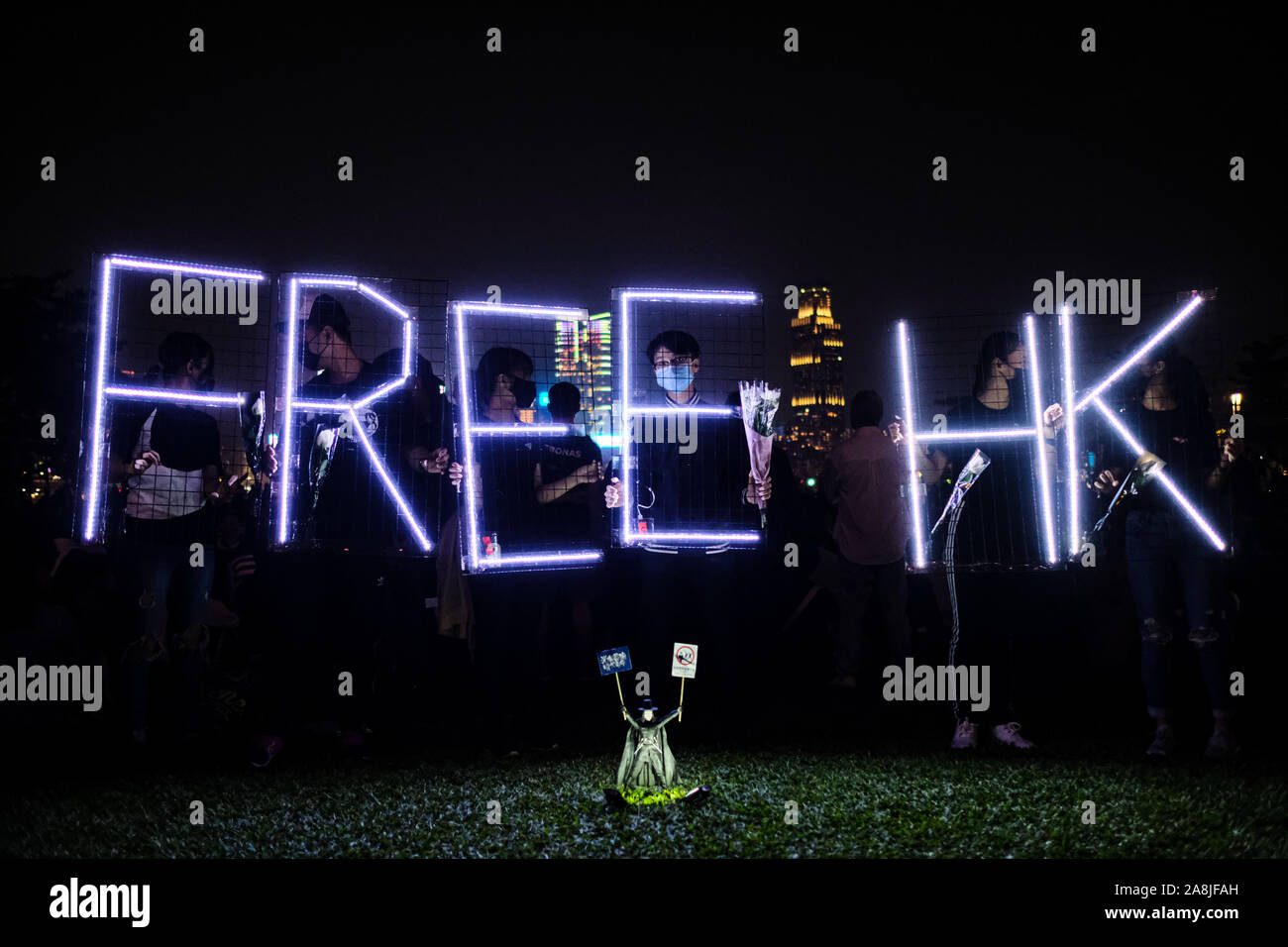 Hong Kong, China. 9th Nov, 2019. A Free HK sign is seen during a memorial rally at Tamar Park in Hong Kong to mourn the death of a 22 years old university student Alex Chow Tsz Lok, who died from a serious brain injury during a fall on November 4th as police skirmished with demonstrators last weekend. He was left in critical condition and died after suffering a cardiac arrest on Friday. Credit: Keith Tsuji/ZUMA Wire/Alamy Live News Stock Photo