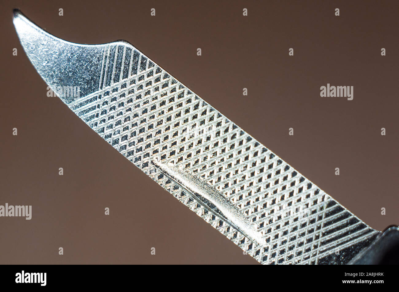 elements small foldable steel multitool, closeup, macro Stock Photo
