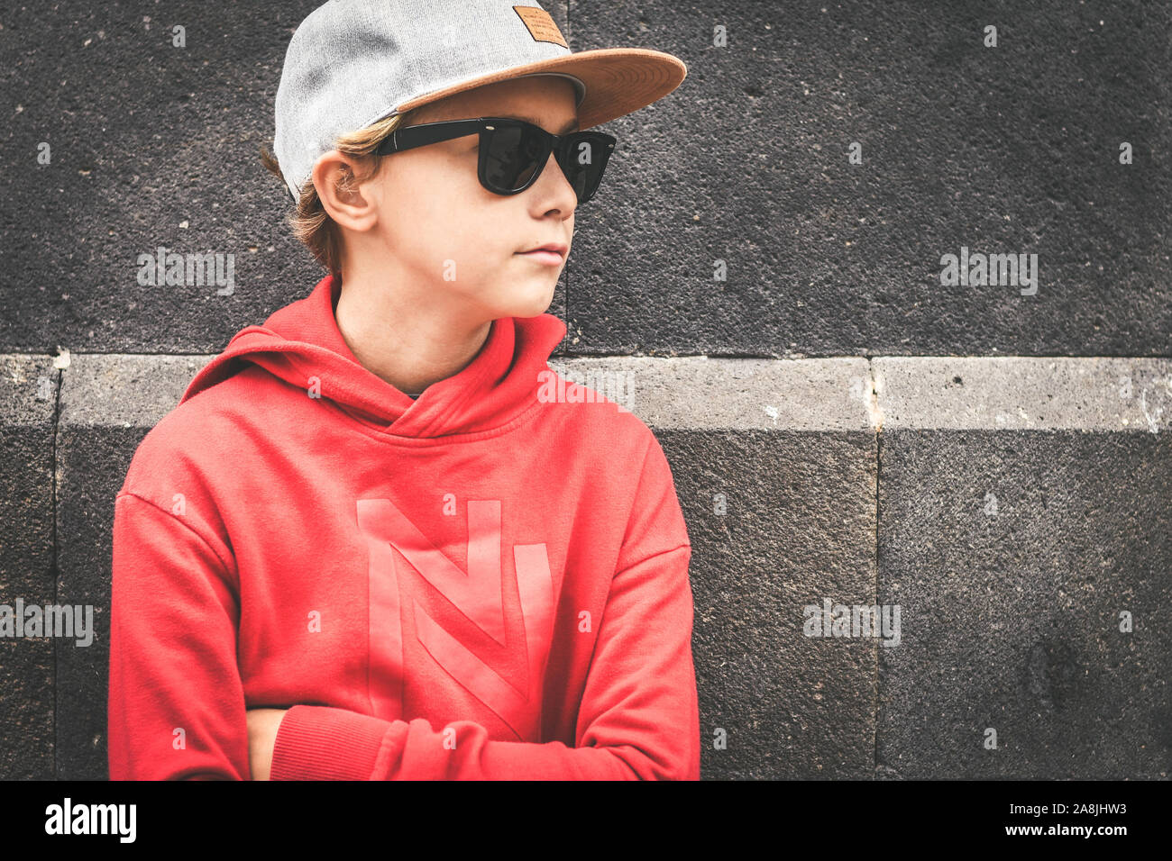 Cool teenager boy leaning on hi-res stock photography and images - Alamy