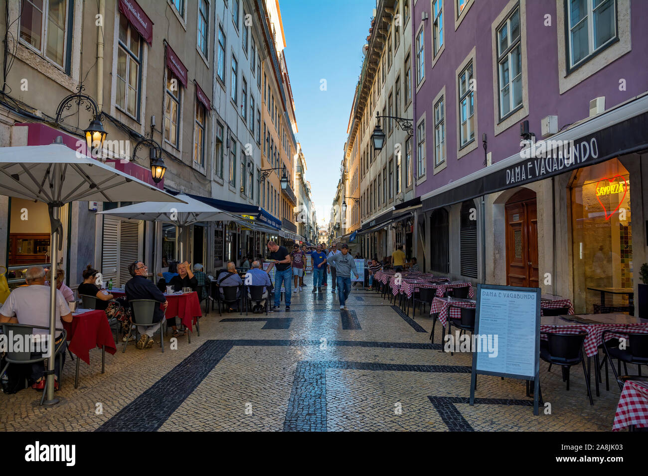 La Rua Augusta pedestrian shopping street with restaurants, caffes and terrace in Baixa , famous district in Lisbon, Portugal. Stock Photo