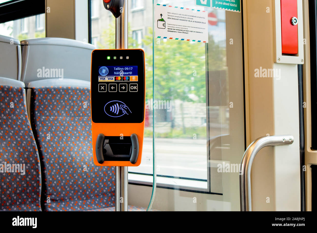 Tallinn, Harjumaa/ Estonia-13JUL2019: QR–ticket or contactless smartcard payment validator machine inside public bus in Tallinn. Stock Photo