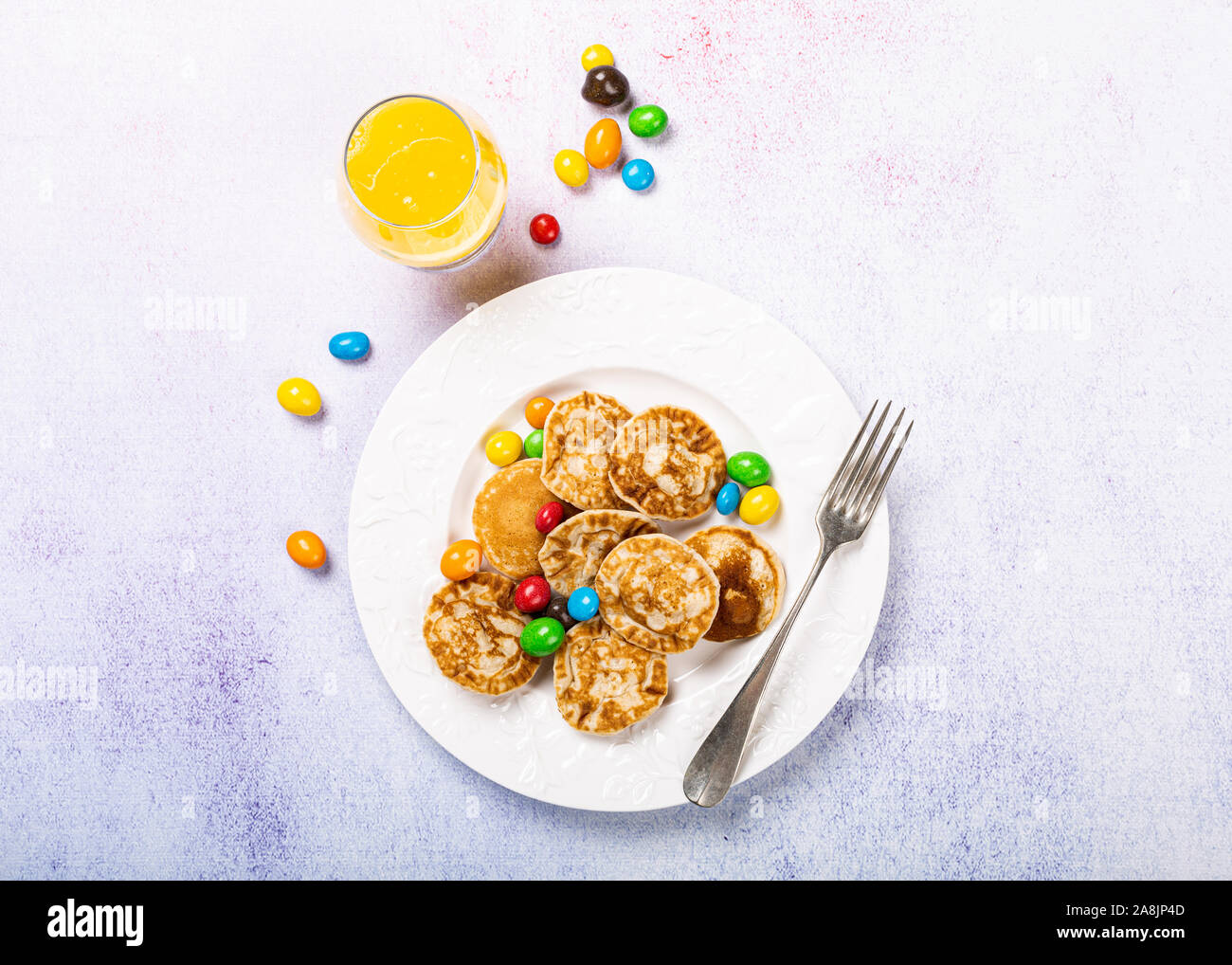 Dutch mini pancakes called poffertjes Stock Photo