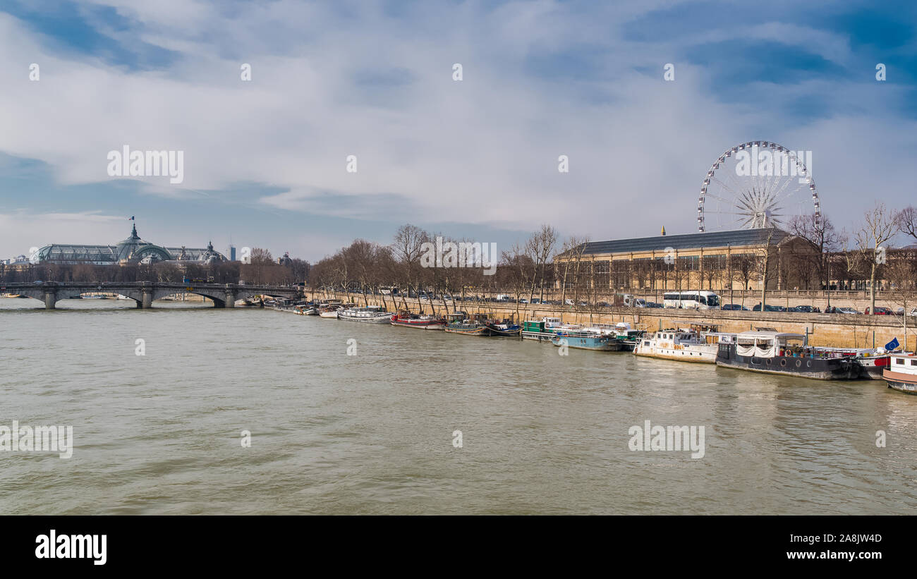 Paris, panorama of the Seine, the Tuileries garden and the big wheel, quai des Tuileries Stock Photo