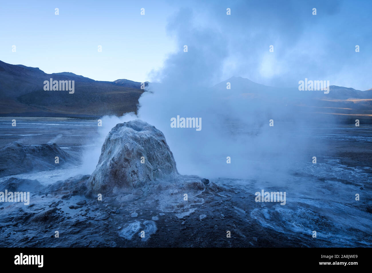 Fumarola of steam of El Tatio Geyser Field in Northern Chile Stock Photo