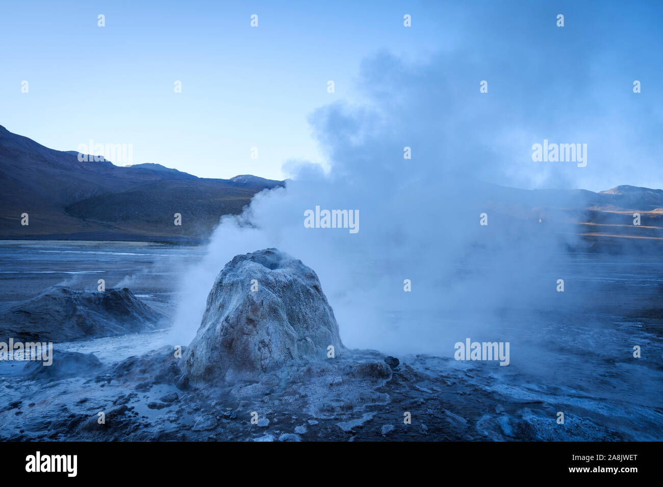 Fumarola of steam of El Tatio Geyser Field in Northern Chile Stock Photo