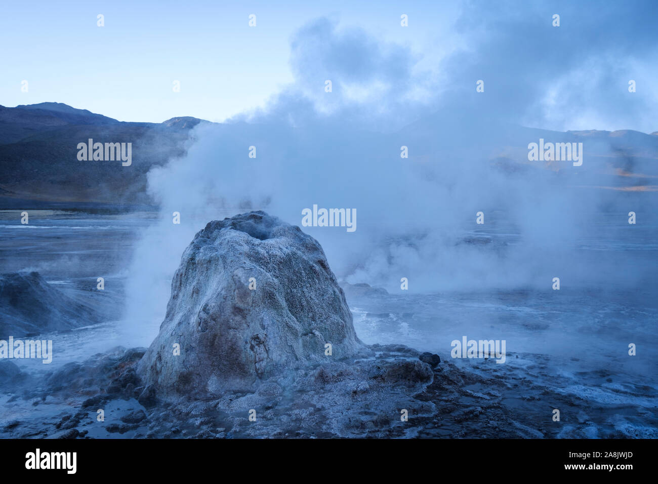 Fumarola of steam of El Tatio Geyser Field in Northern Chile Stock Photo