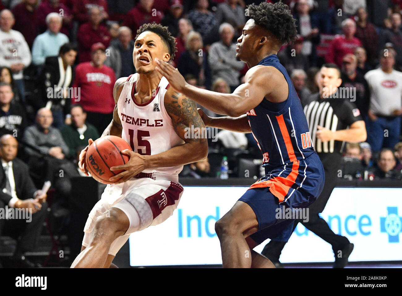 Philadelphia, Pennsylvania, USA. 9th Nov, 2019. Temple Owls guard NATE PIERRE-LOUIS (15) grimaces as he drives by Morgan State Bears guard SHERWYN DEVONISH-PRINCE JR (5) during the basketball game played at the Liacouras Center in Philadelphia. Temple beat Morgan State 75-57. Credit: Ken Inness/ZUMA Wire/Alamy Live News Stock Photo