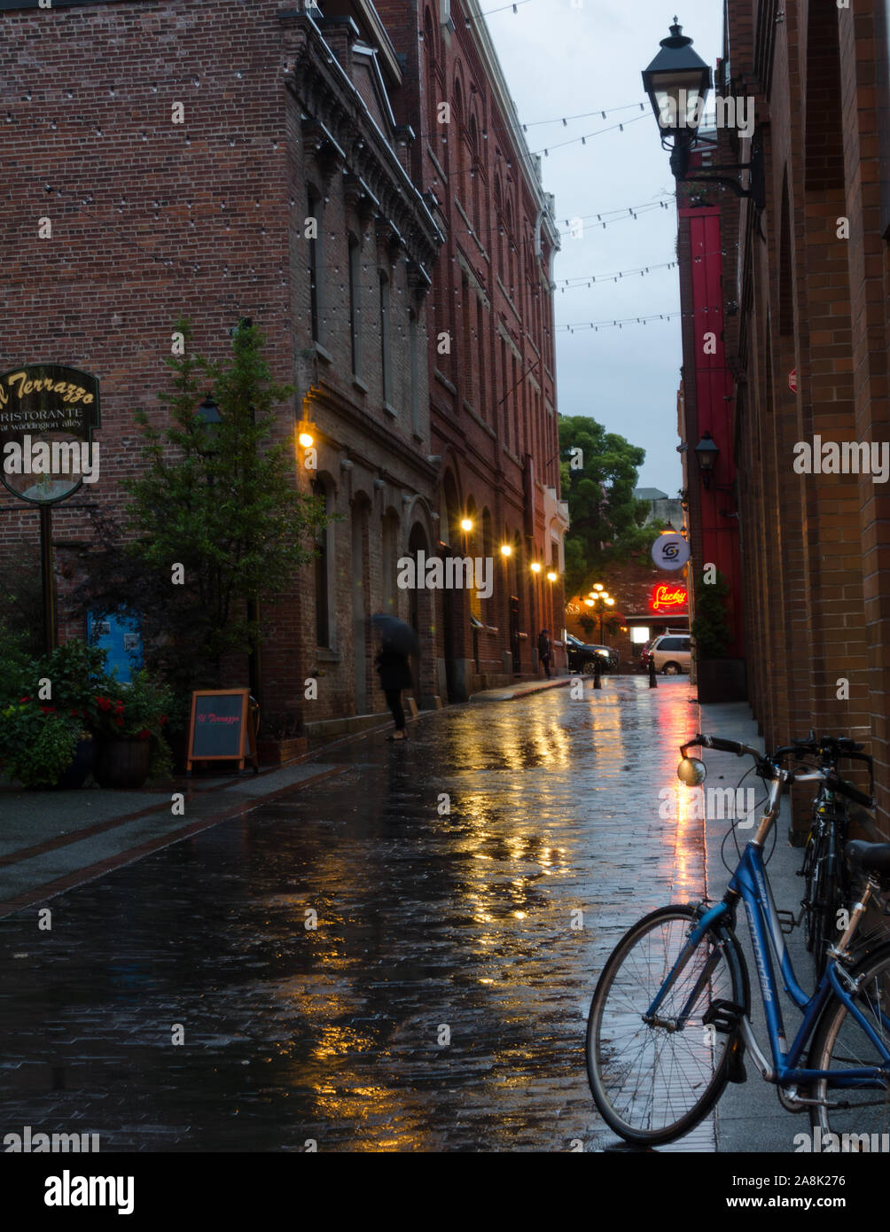 A rainy back alley in Victoria, BC, Canada Stock Photo