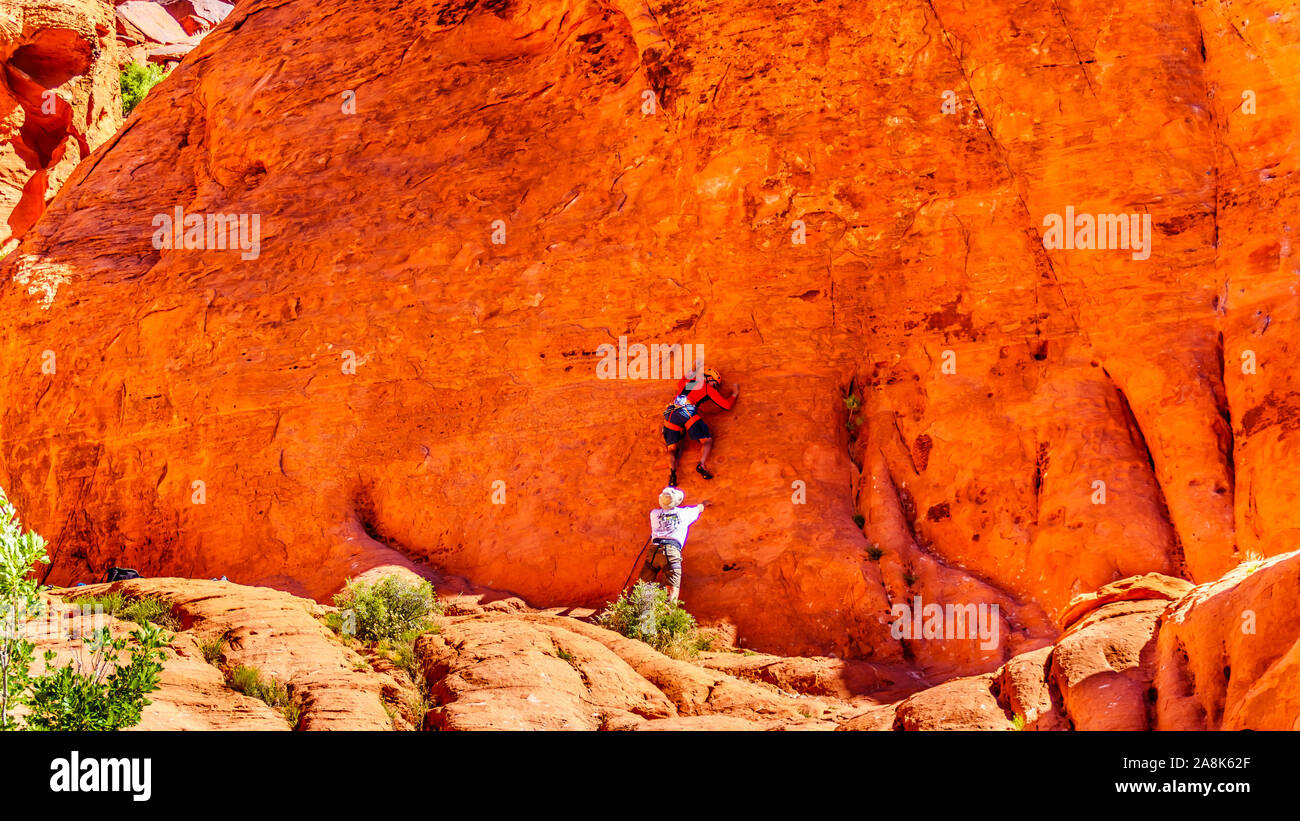 Practicing Repelling and Climbing on the Red Sandstone Mountains at the Guardian Angel Trail in Red Rock Canyon National Conservation Area in Nevada Stock Photo