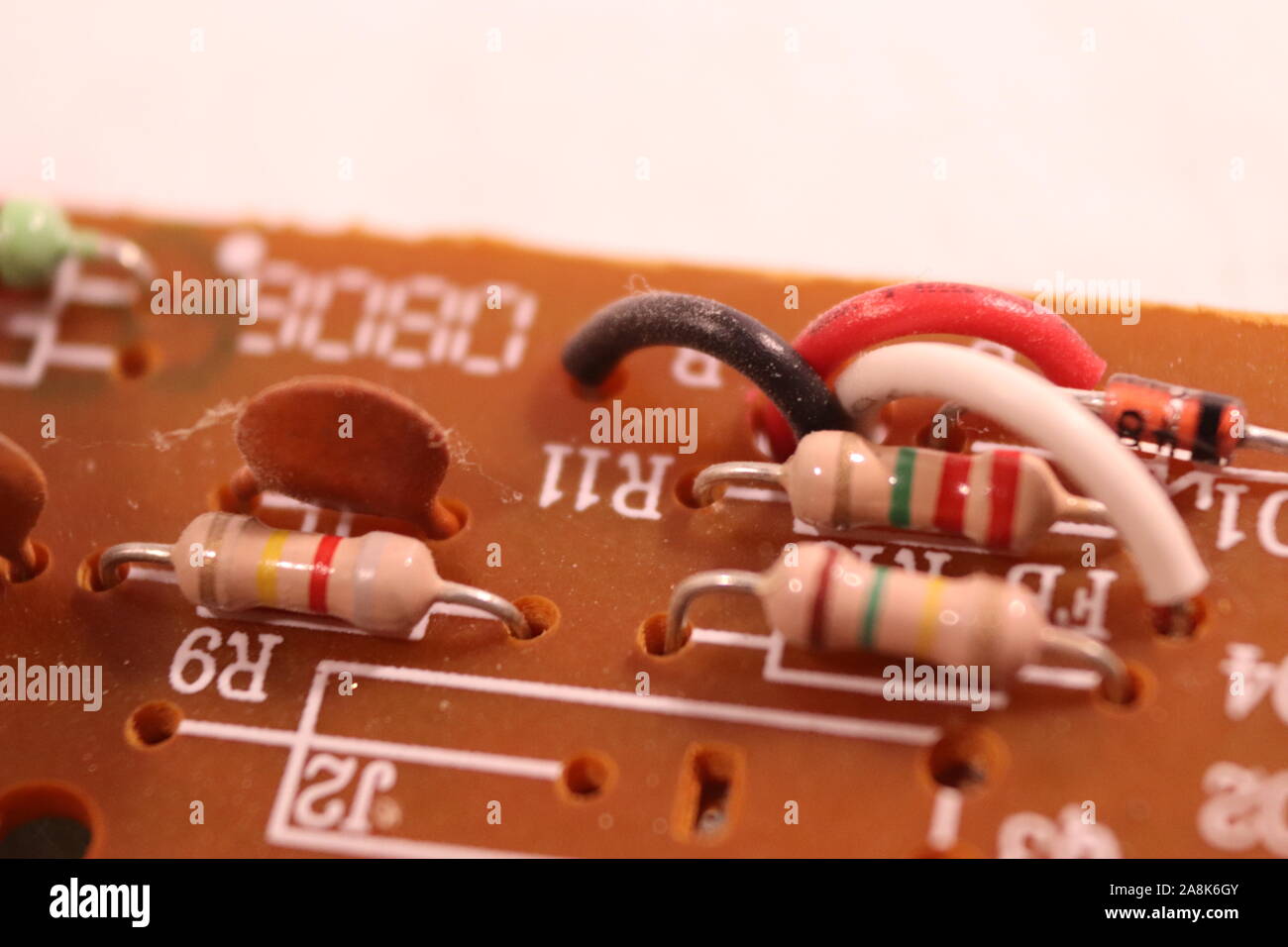 The circuit board of a Kiddie Smoke Detector circa 2007 Stock Photo