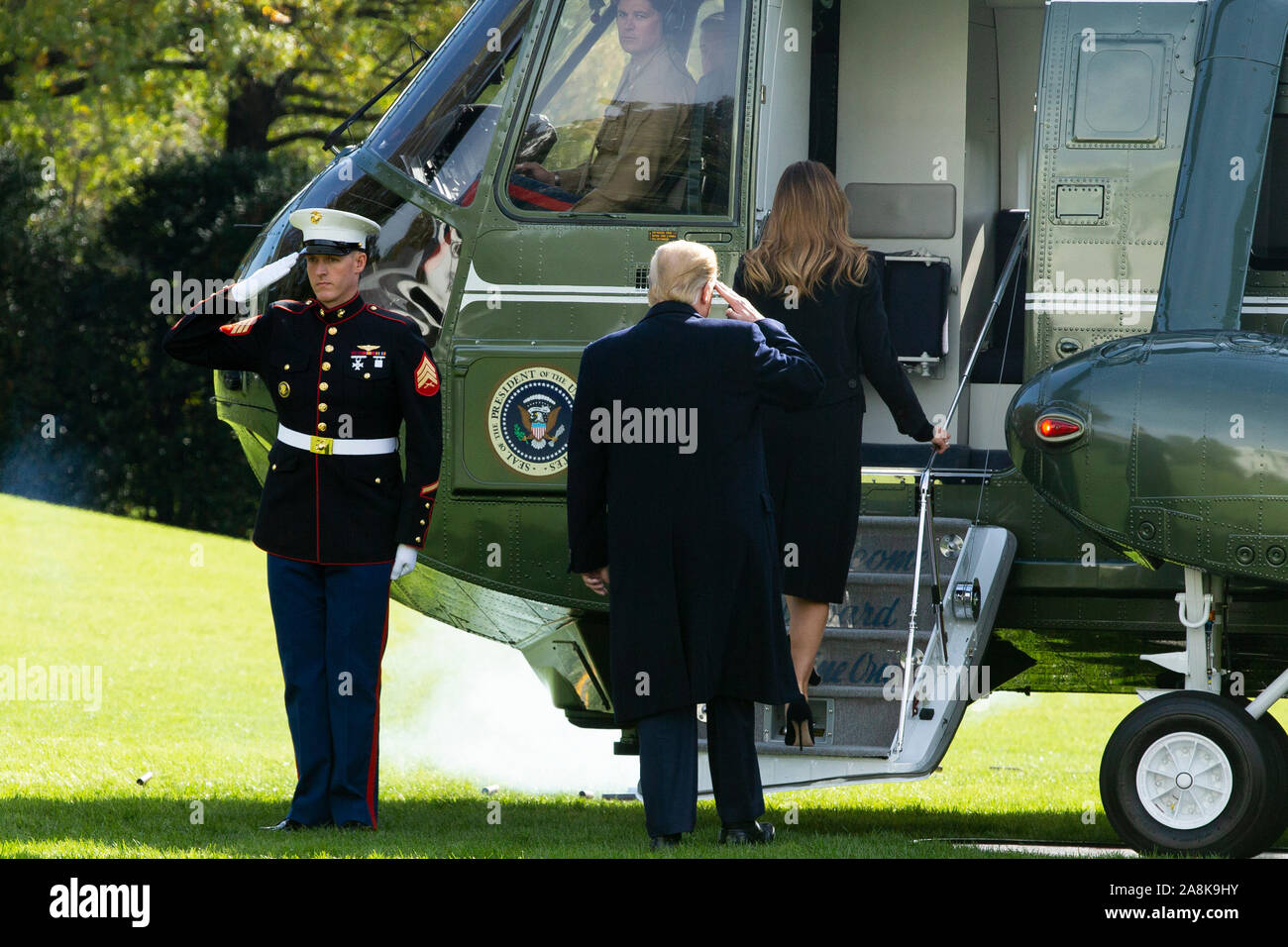 Washington DC, USA. 09th Nov, 2019. US President Donald J. Trump (Bottom R) and First Lady Melania Trump (Back R) board Marine One on the South Lawn of the White House, in Washington, DC, USA, 09 November 2019. The President and First Lady will attend a National Collegiate Athletic Association (NCAA) football game between Alabama and Louisiana State University in Tuscaloosa, Alabama; then they will stay in New York City through Veterans Day. Credit: MediaPunch Inc/Alamy Live News Stock Photo