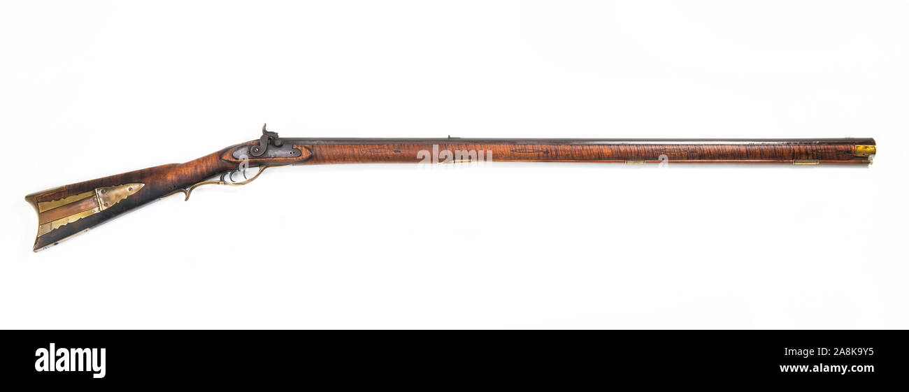 Antique mountain mans tiger maple buffalo rifle.This is a full stock rifle made around 1840 and would of been used to hunt buffalo out West. Stock Photo