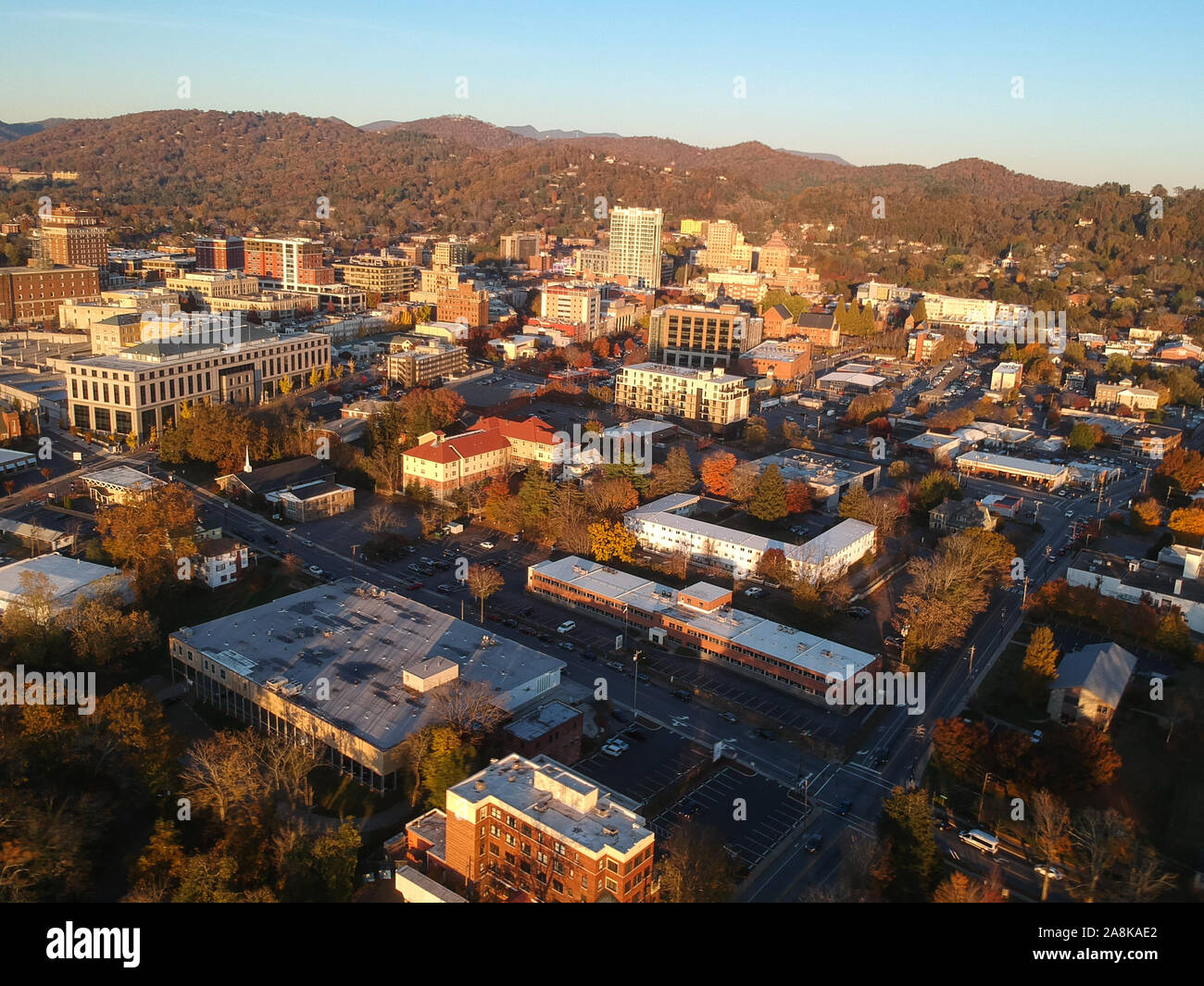 Downtown Asheville, North Carolina. Aerial drone view of the city in the Blue Ridge Mountains during Autumn / Fall Season. Architecture, Buildings, Stock Photo