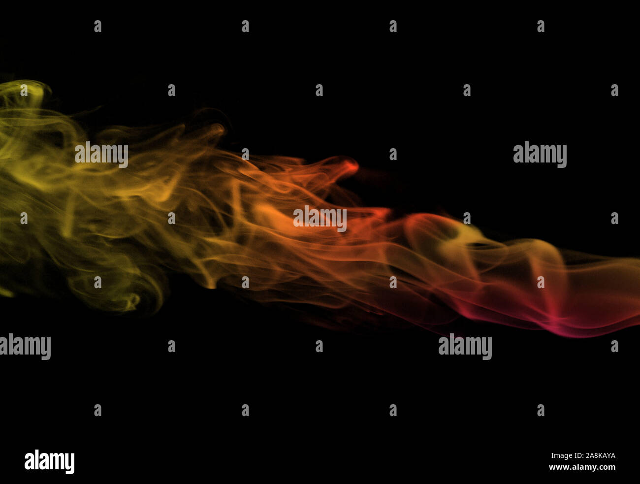 multicolored smoke on a black background Stock Photo