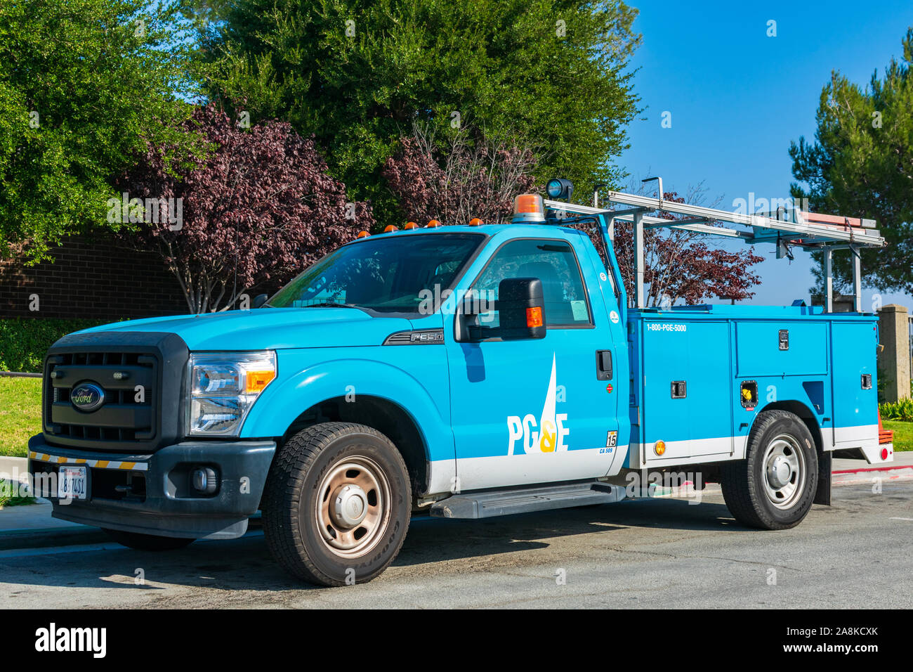 Pacific Gas and Electric Company (PG&E) utility, service and maintenance vehicle parked at customer center Stock Photo