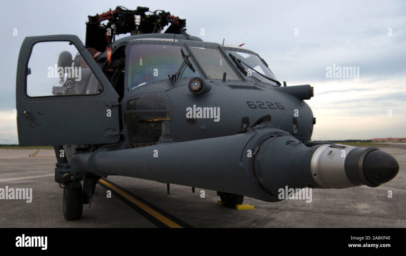 An HH-60 Pave Hawk helicopter assigned to the 305th Rescue Squadron (RQS), Davis-Monthan Air Force Base, Ariz., sits on the flightline at MacDill Air Force Base, Fla., Nov. 5, 2019. MacDill is hosting the 305th RS while they participate in a readiness exercise. (U.S. Air Force photo by Airman 1st Class Ryan C. Grossklag) Stock Photo