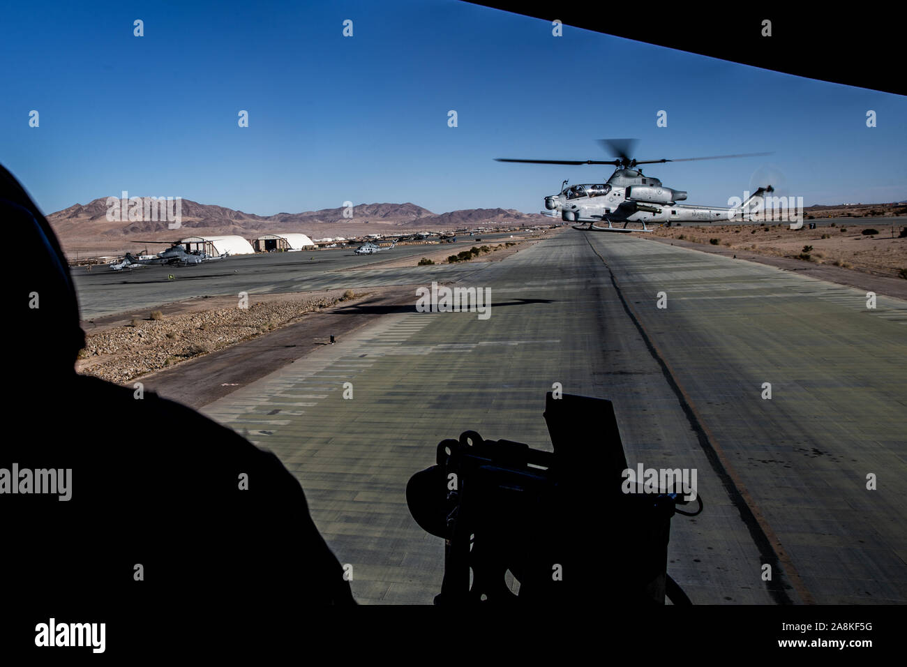 A U.S. Marine Corps UH-1Y Venom helicopter with Marine Light Attack Helicopter Squadron (HMLA) 269, 2nd Marine Aircraft Wing takes-off at the Strategic Expeditionary Landing Field, Marine Corps Air Ground Combat Center, Twentynine Palms, California, Nov. 7, 2019. HMLA-269 provided air support for a tactical recovery of aircraft and personnel training scenario in support of 2nd Marine Division’s (2d MARDIV) execution of MAGTF Warfighting Exercise (MWX) 1-20. MWX is 2nd MARDIV’s largest operation in decades. (U.S. Marine Corps photo by Sgt. Stormy Mendez) Stock Photo