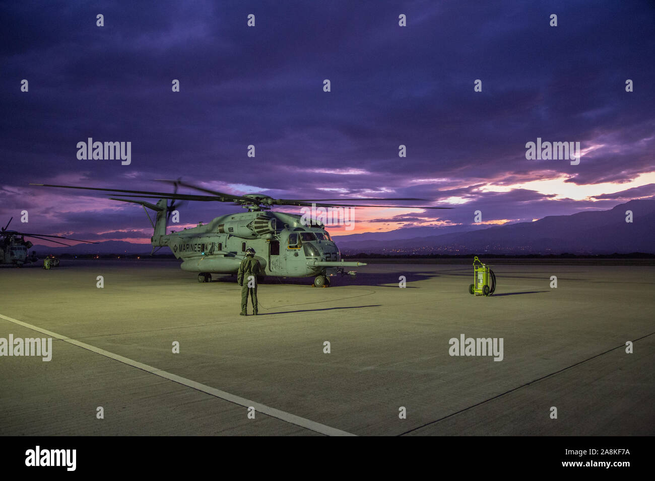 A U.S. Marine Corps CH-53E Super Stallion helicopter belonging to Special Purpose Marine Air-Ground Task Force - Southern Command shuts down on a flight line in Comayagua, Honduras, Nov. 7, 2019. The task force is conducting training and engineering projects hand-in-hand with partner nation military members in Latin America and the Caribbean during their deployment to the region, which coincides with hurricane season. (U.S. Marine Corps photo by Sgt. Stanley Moy) Stock Photo