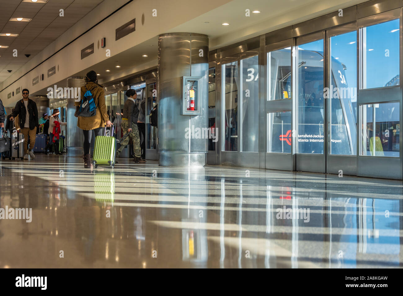 ATL SkyTrain at the Atlanta International Airport domestic terminal connects air travelers to car rentals, airport hotels, and a convention center. Stock Photo