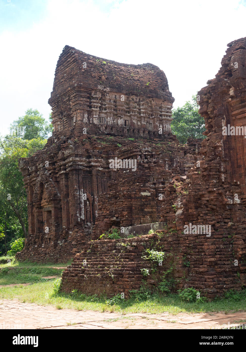 Ancient brown brick buildings with decorative carvings at the ruins of the Champa civilization, a Hindu Temple complex, at My Son, Vietnam. Stock Photo