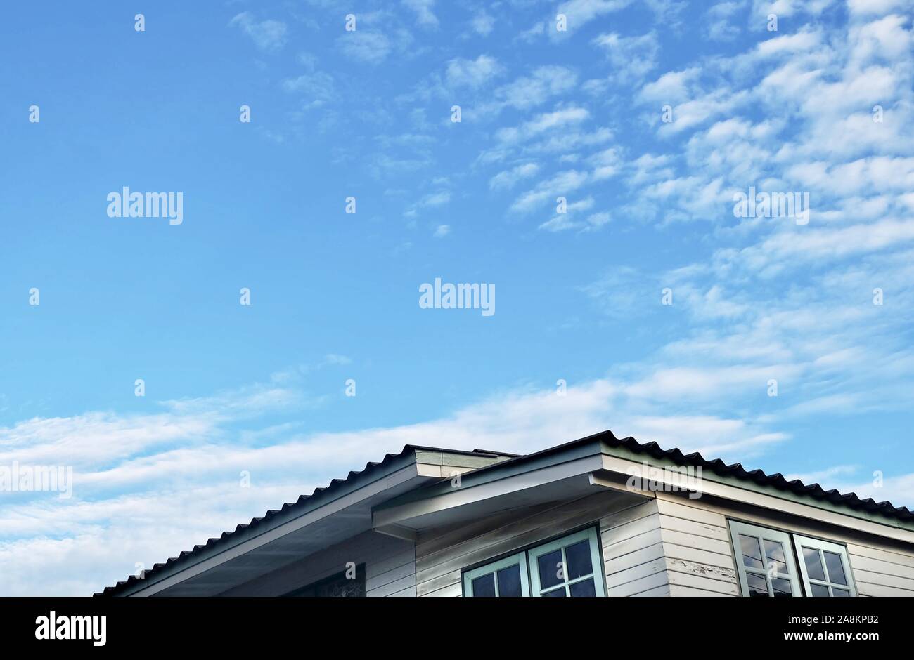 Vintage Wooden White House Against on The Blue Sky with Little Fluffy ...