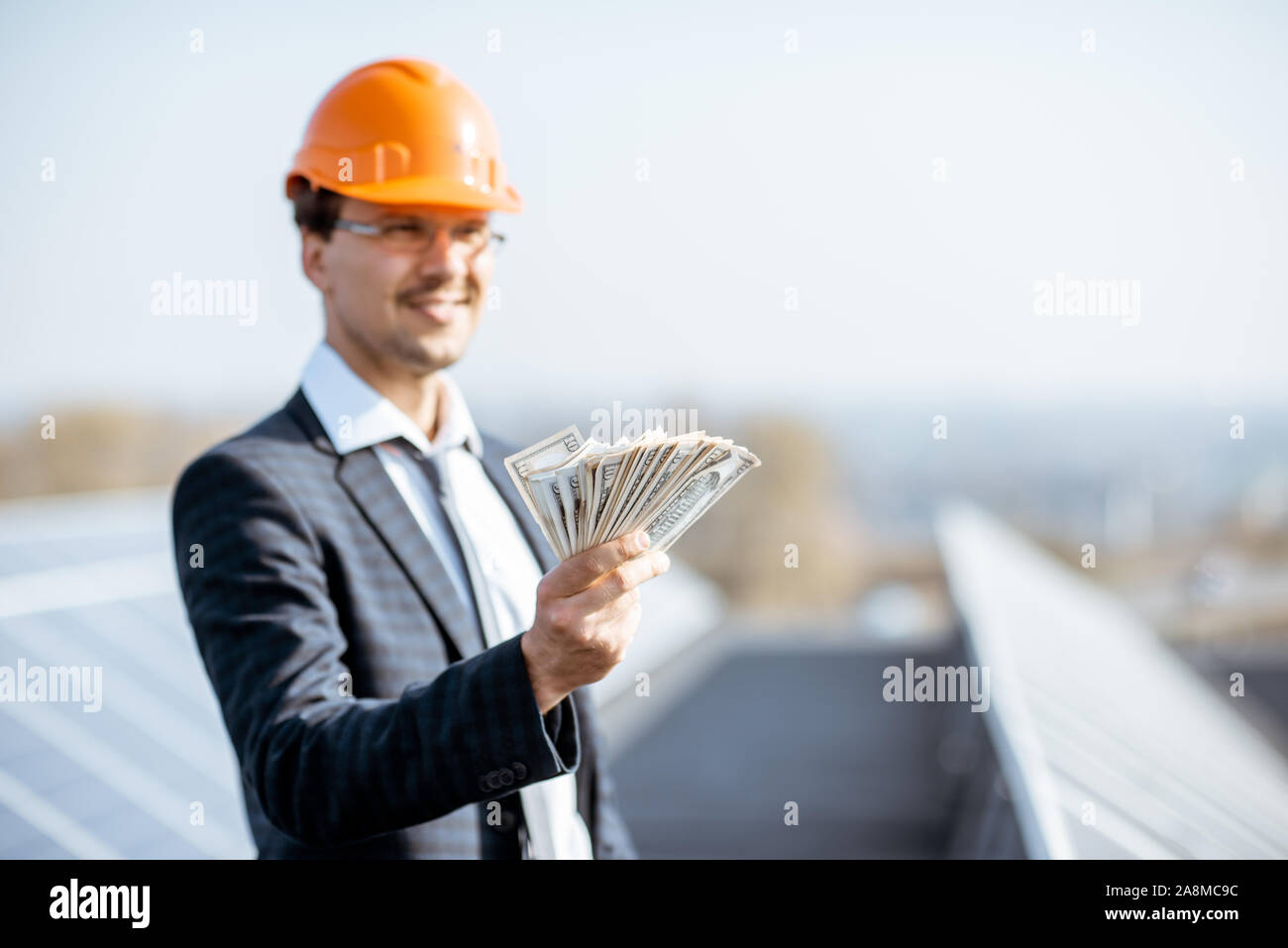 Money cash businessman happy hi-res stock photography and images - Alamy
