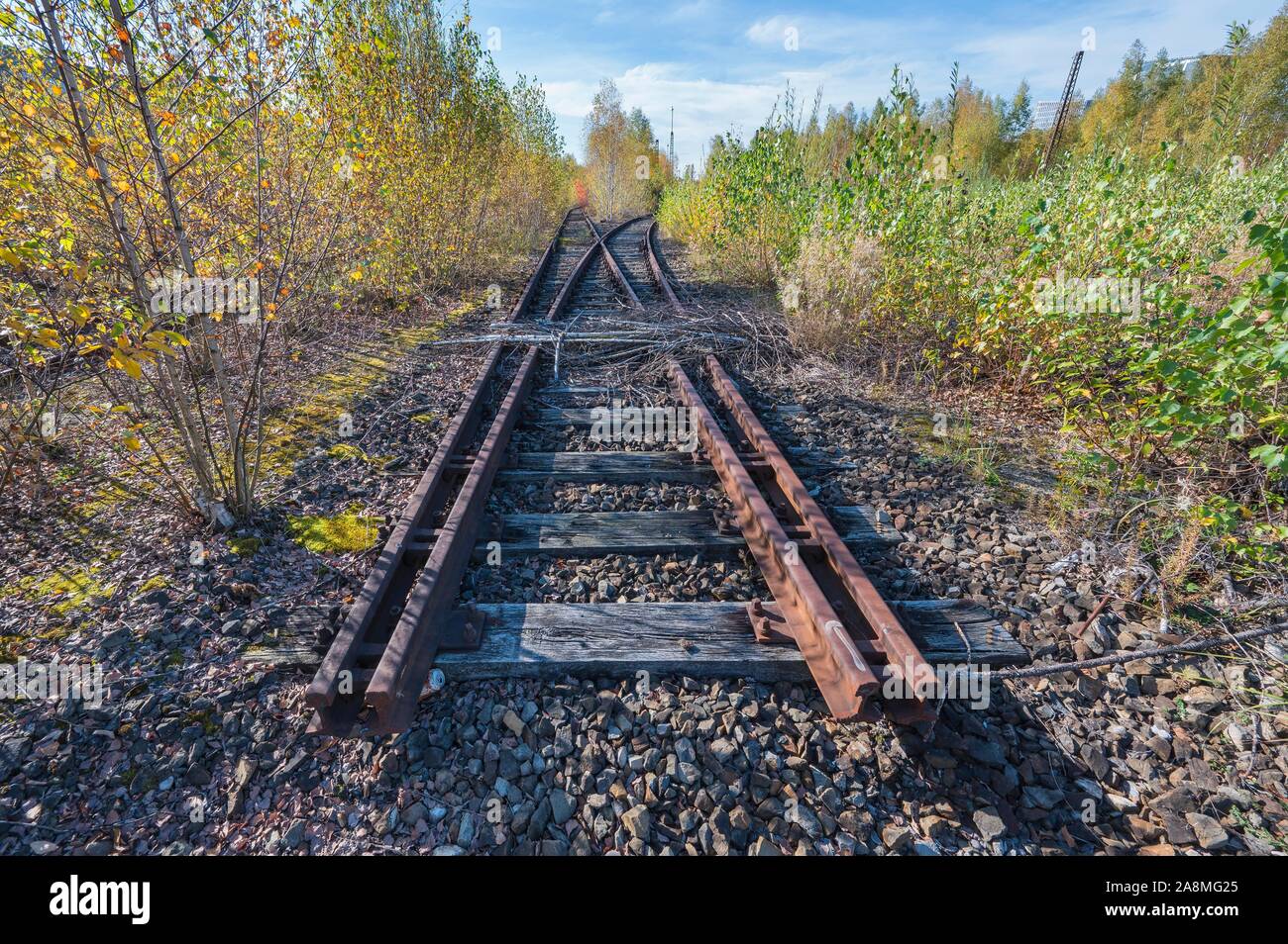 German text Streik (meaning strike) over rusty metal railway tracks and  brackets in a ballast bed, selected focus, narrow depth of field Stock  Photo - Alamy