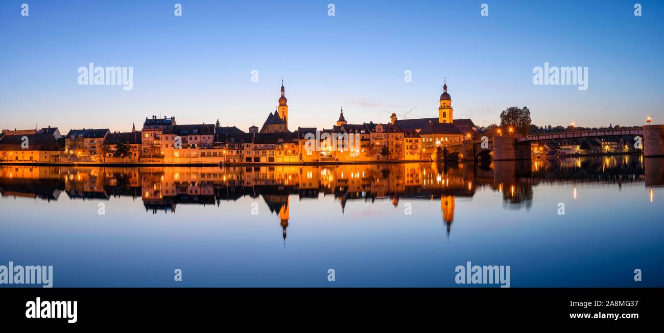 Panorama, city view, Kitzingen am Main during blue hour, Lower Franconia, Bavaria, Germany Stock Photo
