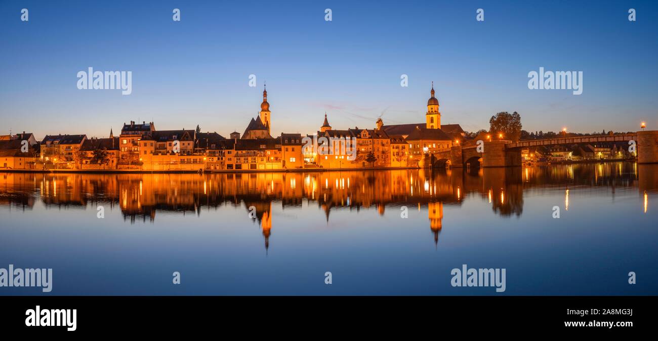 Panorama, city view, Kitzingen am Main during blue hour, Lower Franconia, Bavaria, Germany Stock Photo