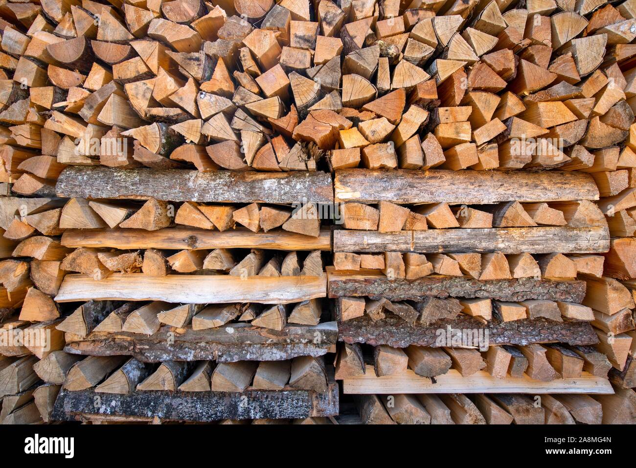 Stacked firewood, Meterscheiter, Schwaz, Tyrol, Austria Stock Photo
