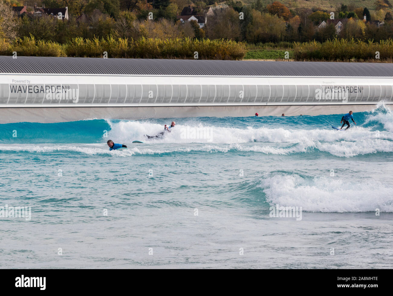 Waves generated artificially at the Wave Bristol, an inland surfing lake in South Gloucestershire, UK Stock Photo
