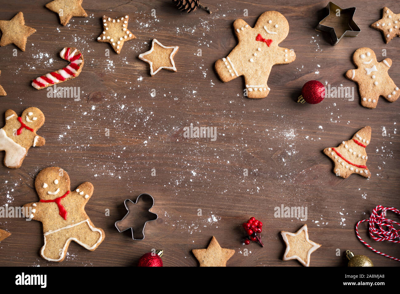 Christmas Gingerbread Cookies on wooden background, top view, copy space.  Homemade traditional festive ginger man and stars flat lay Stock Photo -  Alamy