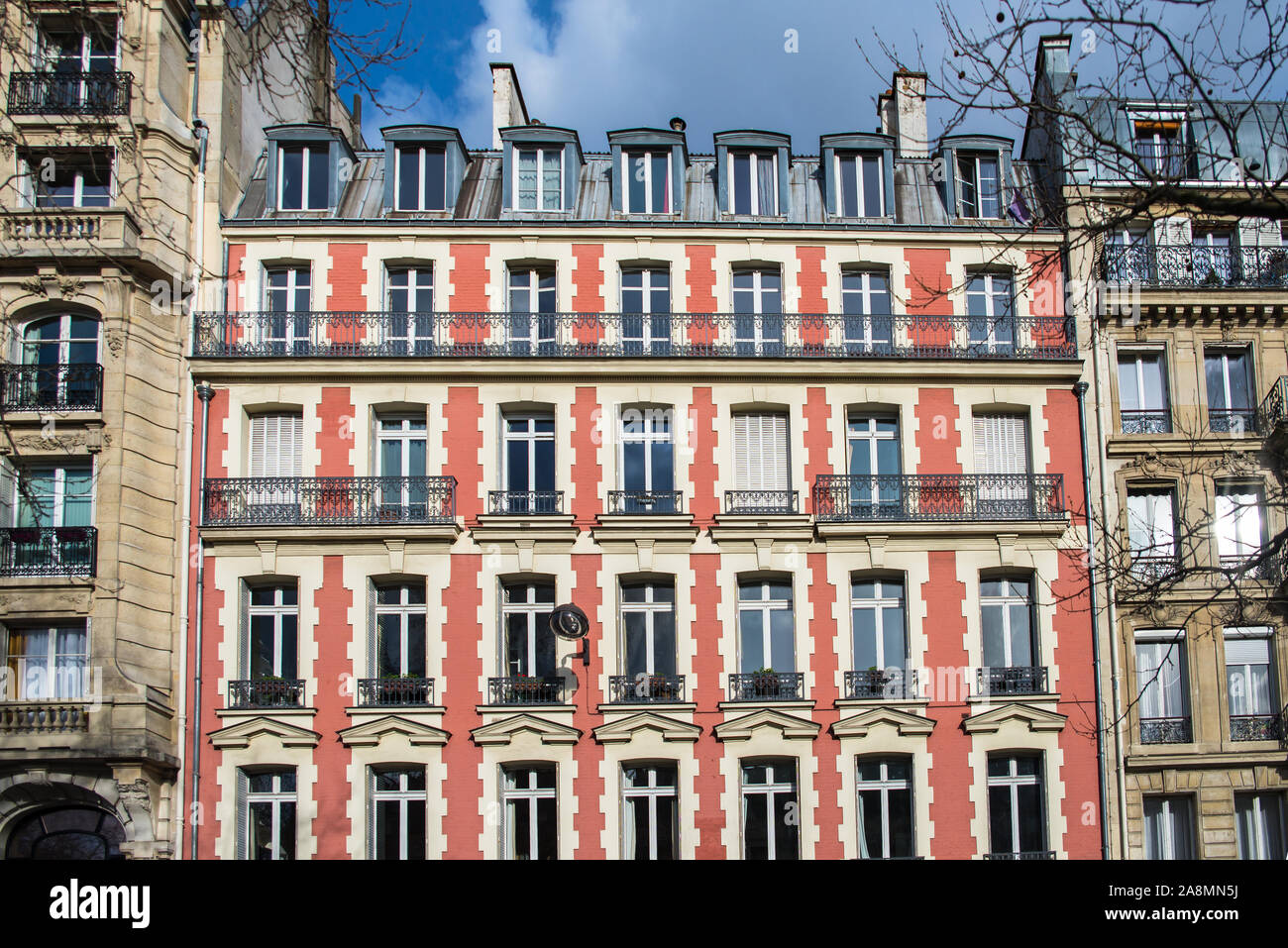 Paris, pink facade, boulevard Richard-Lenoir, typical building in winter Stock Photo