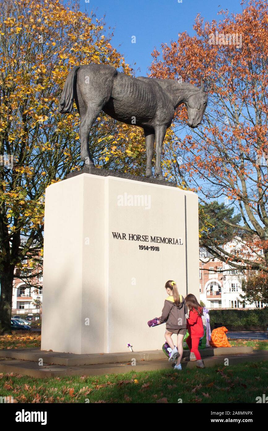 Ascot, UK. 10th Nov, 2019. Wreath laying at the War Horse Memorial, Ascot. Purple poppies are laid to remember equine sacrificies in the First World War. Credit: Andrew Spiers/Alamy Live News Stock Photo