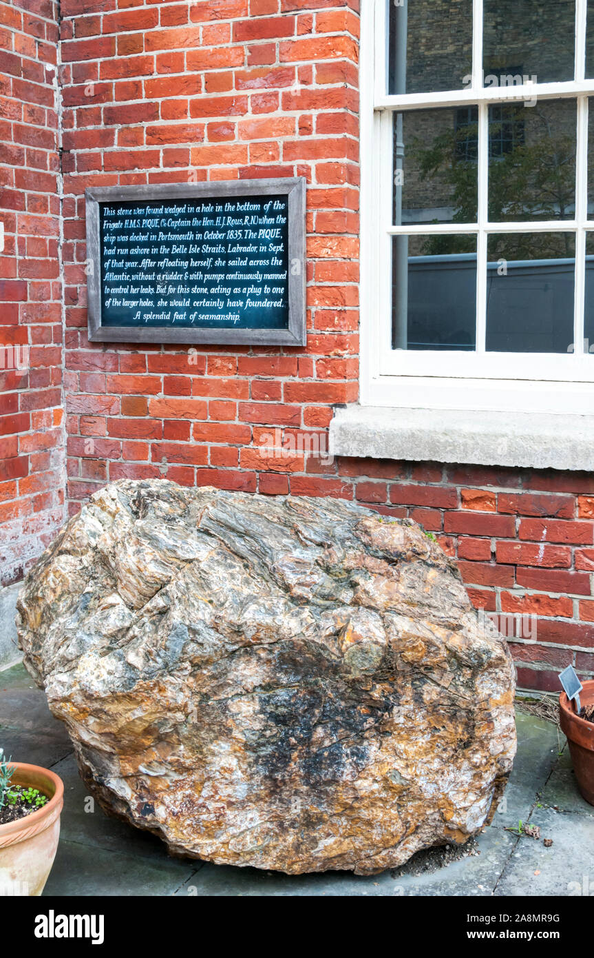 Portsmouth Historic Dockyard. Rock found wedged in a hole in hull of HMS Pique after she ran aground off Labrador in 1835. DETAILS IN DESCRIPTION. Stock Photo