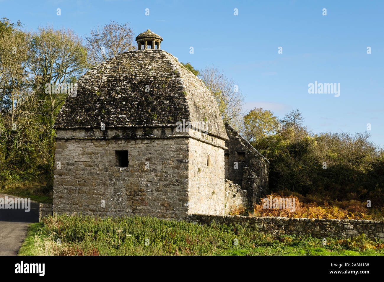 17th century dovecote with cupola by toll road to Trwyn Du or Penmon Point at Penmon Priory on Isle of Anglesey, North Wales, UK, Britain Stock Photo