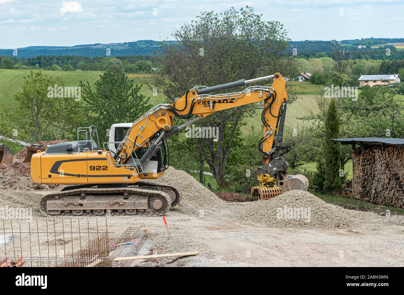 construction work on the site. Escavator, stones. closeup Stock Photo